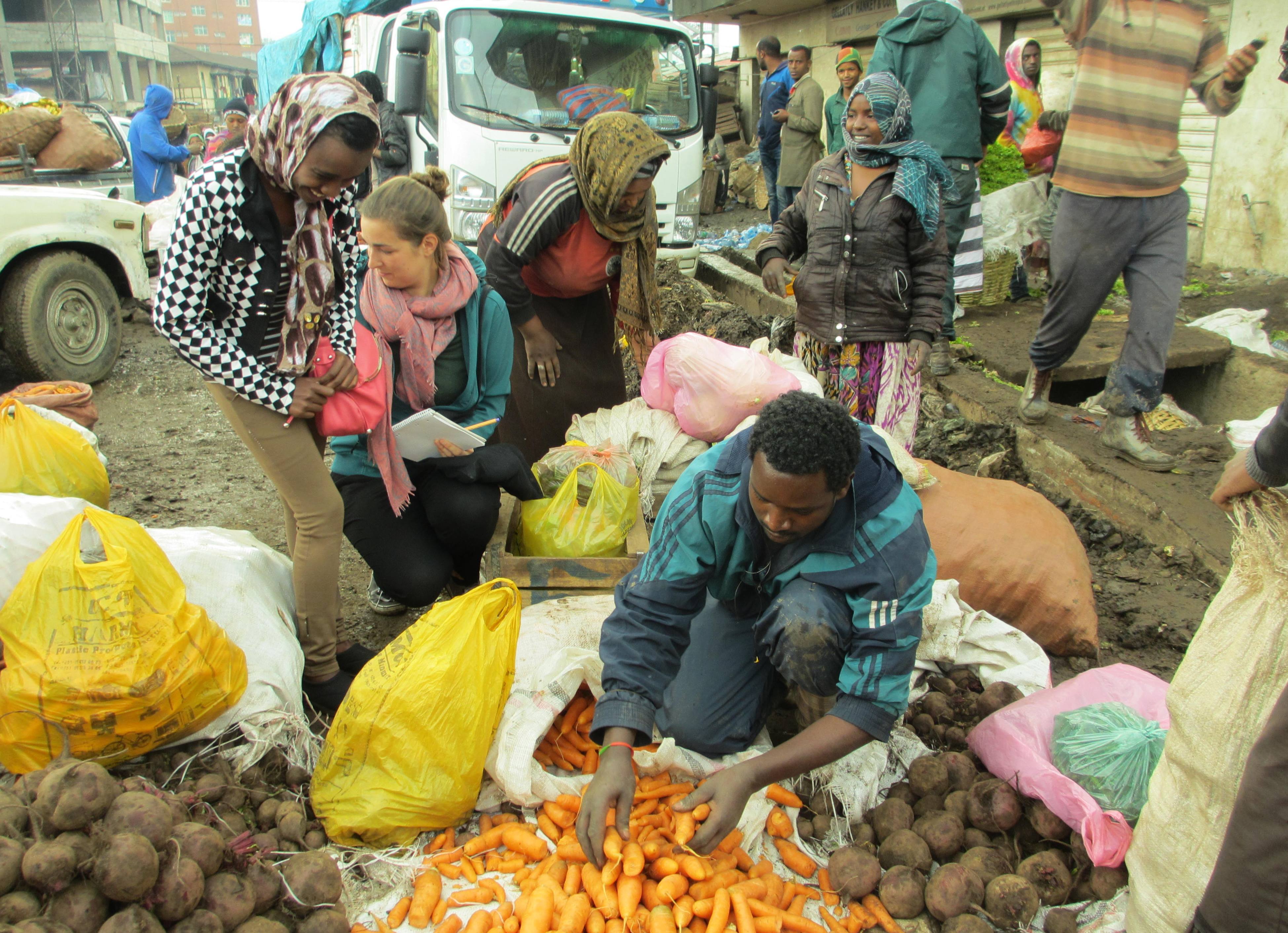 Students conducting interviews at the vegetable market in Addis Ababa